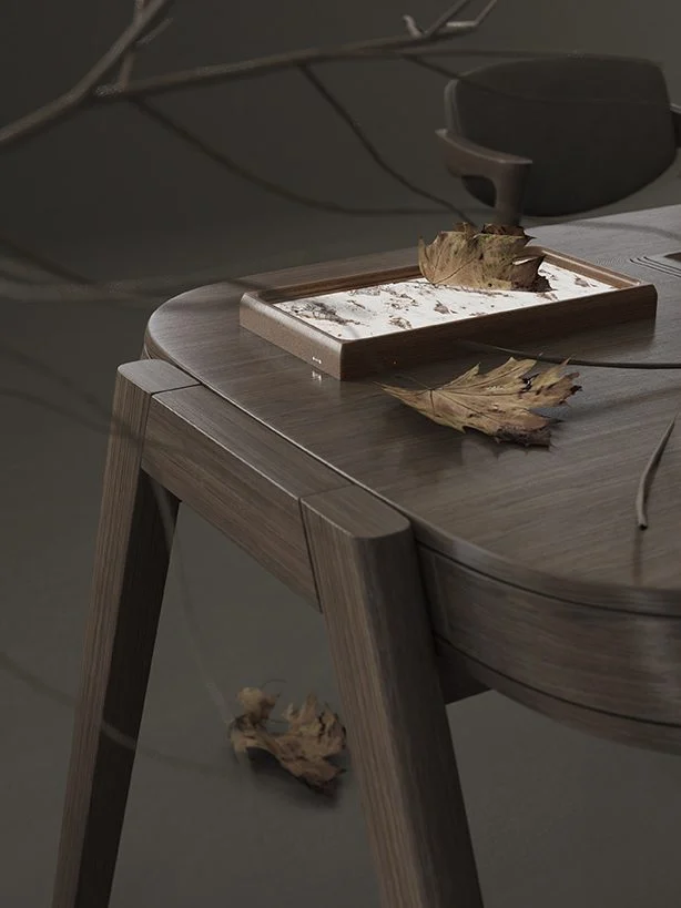 A stone tray glowing on a wooden side table with autumn leaves