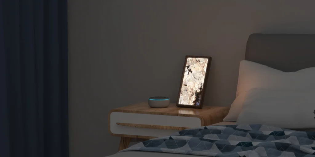 A stone night lamp on a bedside table